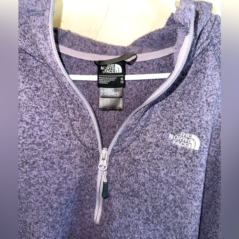 The North Face quarter zip pull over with hoodie.